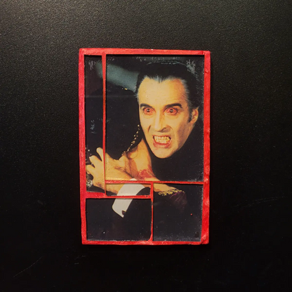 Glass mosaic magnet "Dracula and his victim"