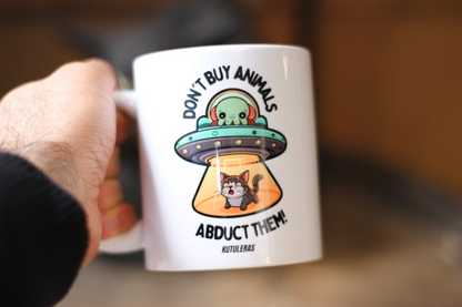 Kutuleras Mug "Don't buy animals, abduct them!"